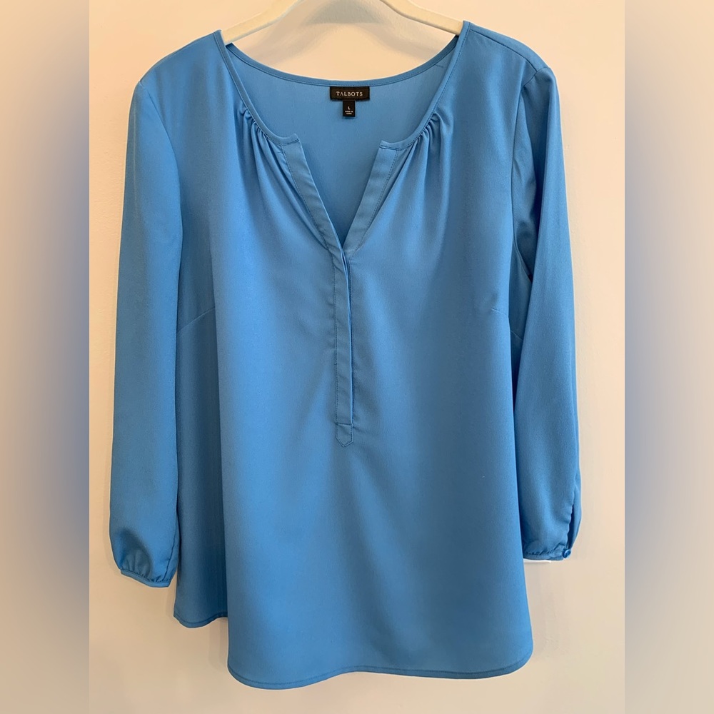 Sky blue blouse; v neck with front buttons; 3/4 length sleeves